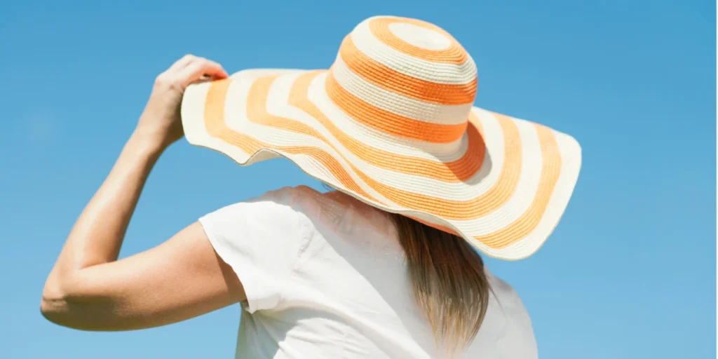 Person wearing a sun protection hat
